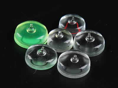There are six transparent glass circular bubble level vials with tip.